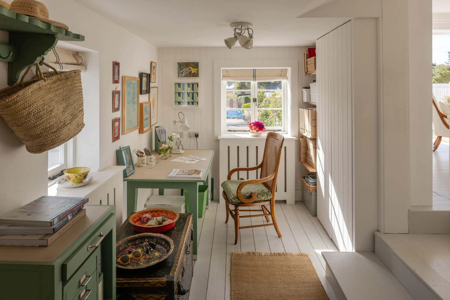 Side room with green cabinetry
