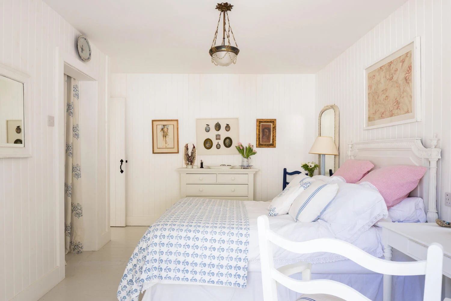 White bedroom with twin beds