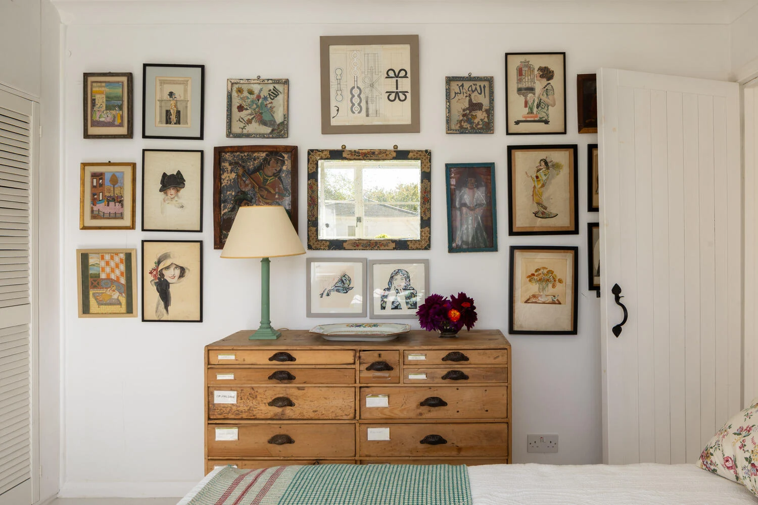 Bedroom picture wall and timber chest